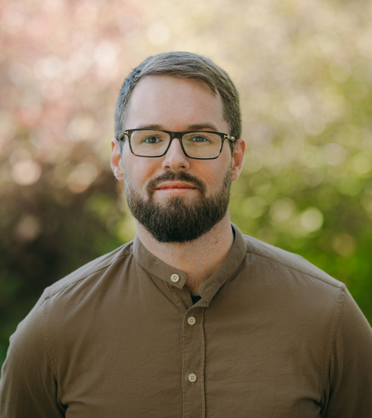 Professional headshot of Malte Hessenius, Senior Analyst at Climate & Company, specializing in biodiversity risks, transition finance, and data analysis